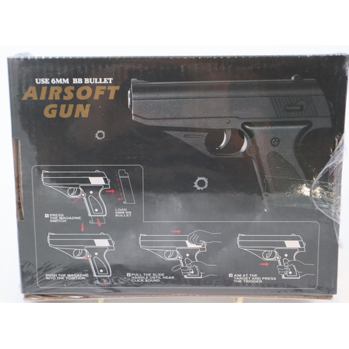 2007 - New boxed 6mm airsoft pistol, model V7, in tan. P&P Group 2 (£18+VAT for the first lot and £3+VAT fo... 