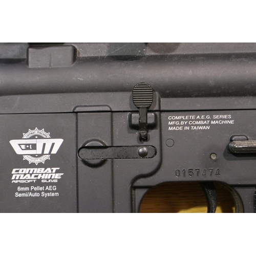 2020 - AEG Combat Machine 6mm airsoft assault rifle, lacking inner barrel, together with a Combat Delta 6mm... 
