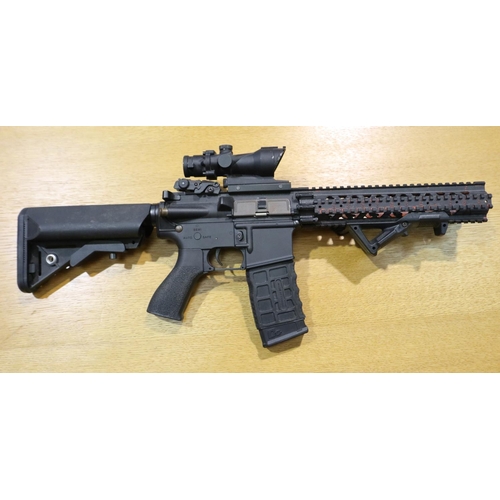2020 - AEG Combat Machine 6mm airsoft assault rifle, lacking inner barrel, together with a Combat Delta 6mm... 