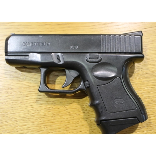 2020 - AEG Combat Machine 6mm airsoft assault rifle, lacking inner barrel, together with a Combat Delta 6mm... 