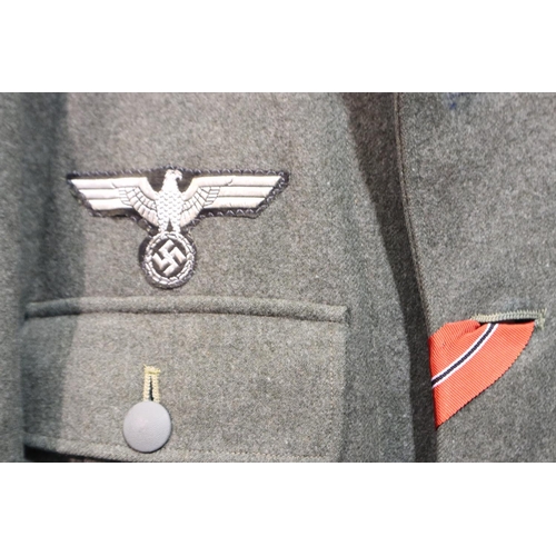 2032 - Norwegian WWII M42 HBT tunic and trousers, the tunic later badged in good order, approximate size S.... 