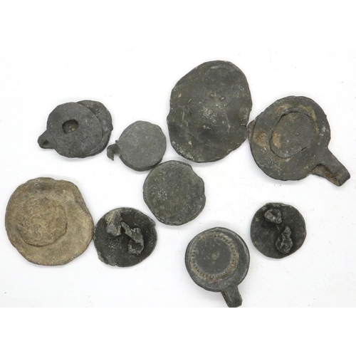 100 - Nine workhouse Medieval lead seals, largest 35 mm. P&P Group 0 (£5+VAT for the first lot and £1+VAT ... 