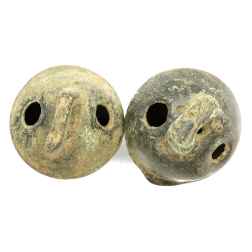 101 - Two bronze cows Crotal Bells, L: 40 mm. P&P Group 0 (£5+VAT for the first lot and £1+VAT for subsequ... 