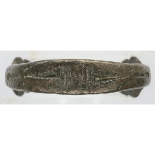 113 - 12th century bronze bracelet, zoomorphic with snake terminals, D: 45 mm. P&P Group 0 (£5+VAT for the... 