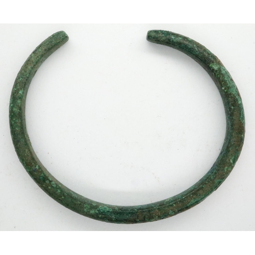 114E - 2nd century Tribal bronze bracelet, D: 60 mm. P&P Group 0 (£5+VAT for the first lot and £1+VAT for s... 