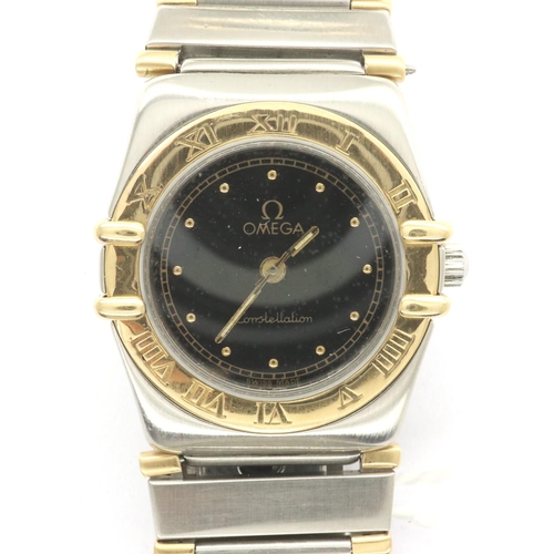 128 - Omega Constellation ladies wristwatch, gold and steel cased with graduated bracelet, black dial with... 