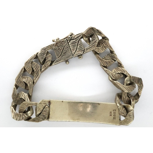 15 - Hallmarked silver bark effect ID bracelet, L: 20 cm, London assay, 66g. P&P Group 1 (£14+VAT for the... 