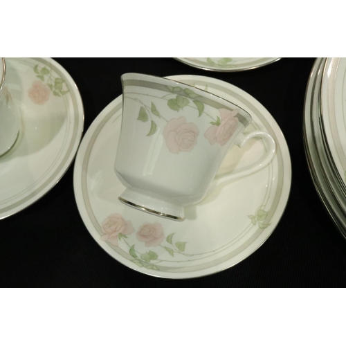 172 - Royal Doulton tea and dinner service in the Twilight Rose pattern, mostly second quality. (42) Light... 