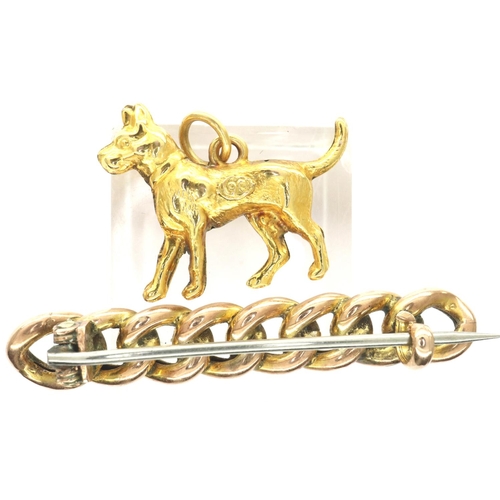 24 - Victorian (presumed, unmarked) gold brooch, L: 45 mm, and a 9ct gold dog charm, combined 3.0g. P&P G... 