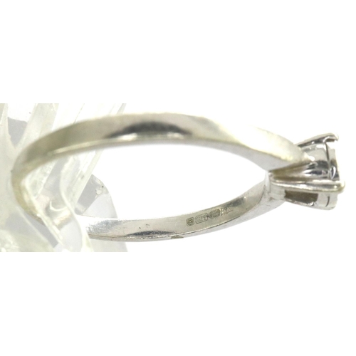 47 - 9ct white gold ring set with seven diamonds, size O/P, 2.1g. P&P Group 1 (£14+VAT for the first lot ... 