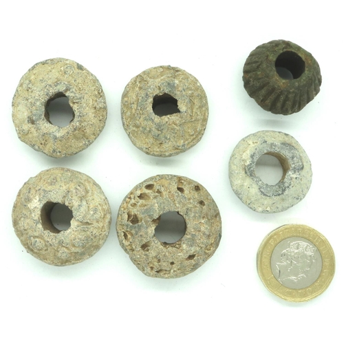 96 - Six lead Medieval spinning whorls, approximately largest D: 30 mm. P&P Group 0 (£5+VAT for the first... 