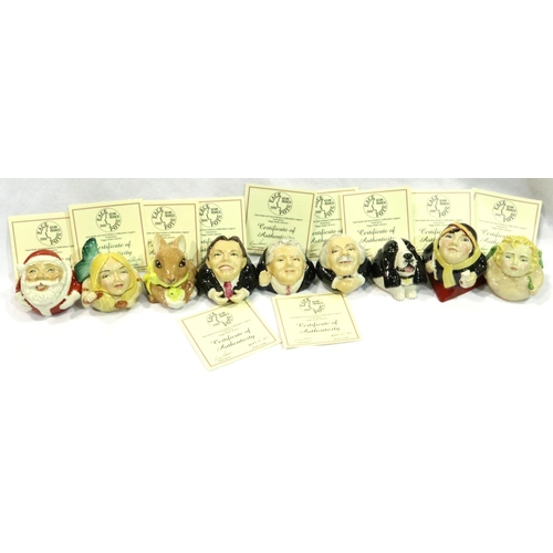 225 - Nine Kevin Francis face pots including Clarice Cliff, with certificates, largest H: 60 mm. P&P Group... 