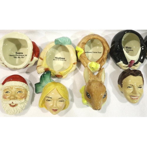 225 - Nine Kevin Francis face pots including Clarice Cliff, with certificates, largest H: 60 mm. P&P Group... 