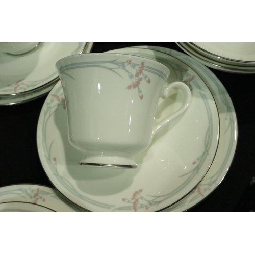 247 - Forty seven piece Royal Doulton dinner service in the Carnation pattern. No damages, some light usag... 