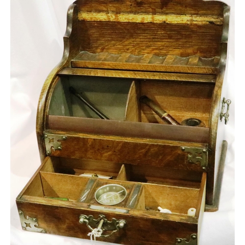 284 - Pipe smokers box with tambour front contents to include Meerschaum pipes, lacking pipe rack. P&P Gro... 