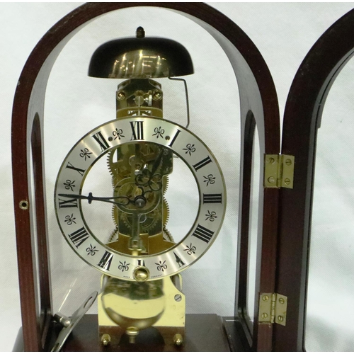 328 - Hermle skeleton clock with ting tang hour strike in mahogany case with key working. Not available fo... 