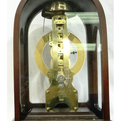 328 - Hermle skeleton clock with ting tang hour strike in mahogany case with key working. Not available fo... 