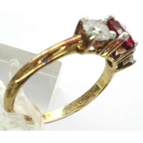 13A - 14ct gold trilogy ring set with a single ruby flanked by two white topaz stones, size U, 3.4g. Very ... 