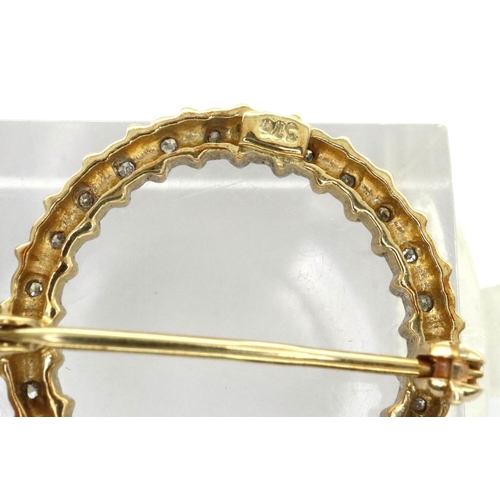 14A - 9ct gold diamond set halo brooch, D: 15 mm, 1.7g. P&P Group 1 (£14+VAT for the first lot and £1+VAT ... 