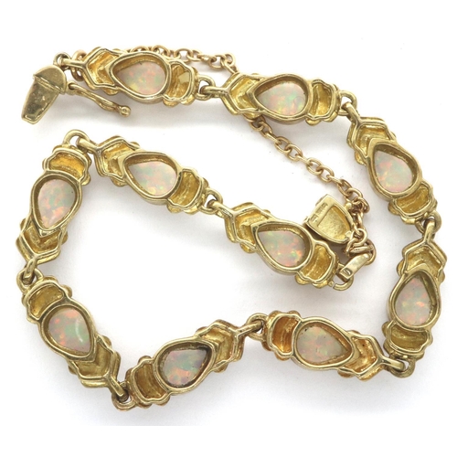 7A - 9ct gold opal set bracelet, L: 16 cm, 10.8g. P&P Group 1 (£14+VAT for the first lot and £1+VAT for s... 