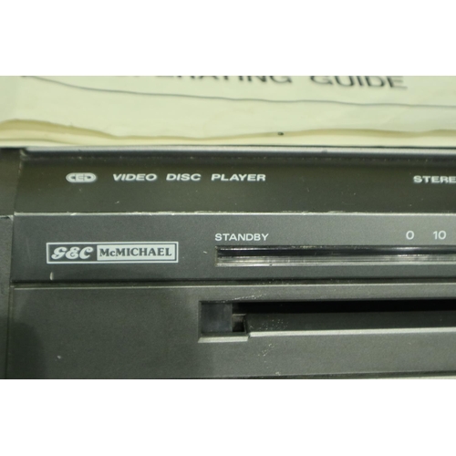 363 - GEC McMichael stereo video disc player model V5000H with seven discs, remote control, power supply a... 