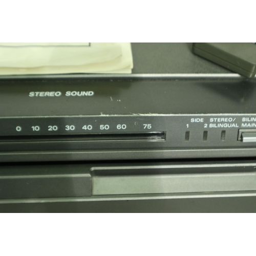 363 - GEC McMichael stereo video disc player model V5000H with seven discs, remote control, power supply a... 