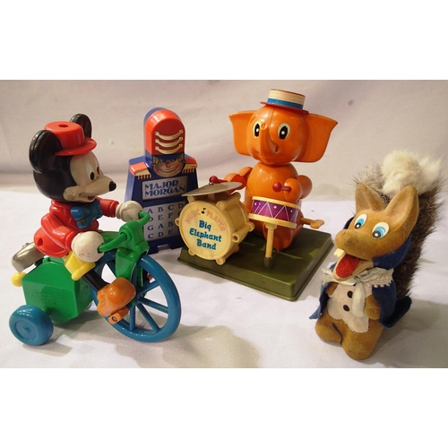 2022 - Vintage plastic toys including drumming elephant and cycling Mickey Mouse, both clockwork. Plus a ba... 