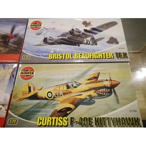 2082 - Four Airfix 1/72 aircraft kits to include Kittyhawk, Typhoon, Beaufighter and BF109E, all sealed box... 