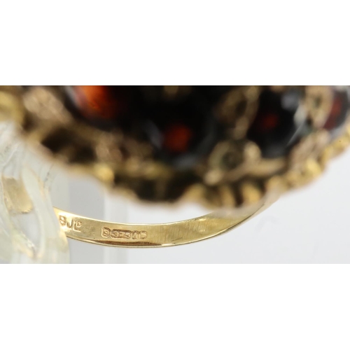 32 - 9ct gold garnet set orb ring, size L, 5.8g. P&P Group 1 (£14+VAT for the first lot and £1+VAT for su... 