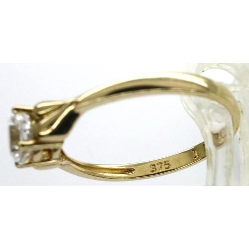 5 - 9ct gold solitaire ring set with CZ, size N/O, 1.7g. P&P Group 1 (£14+VAT for the first lot and £1+V... 