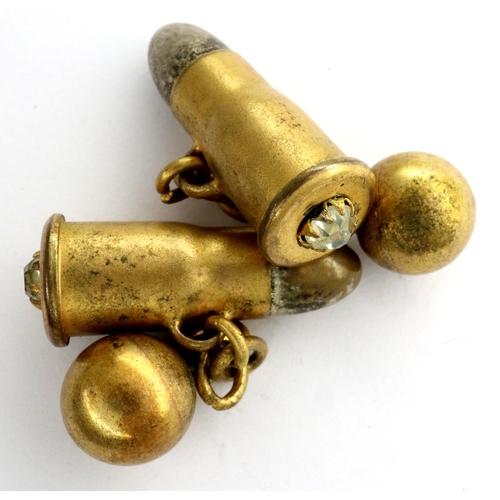 63 - Pair of bullet form cufflinks with stone set base, combined 6.8g. P&P Group 1 (£14+VAT for the first... 