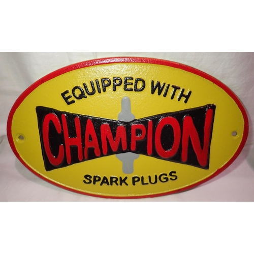 1049 - Cast iron Champion Spark Plugs sign, W: 27 cm. P&P Group 1 (£14+VAT for the first lot and £1+VAT for... 