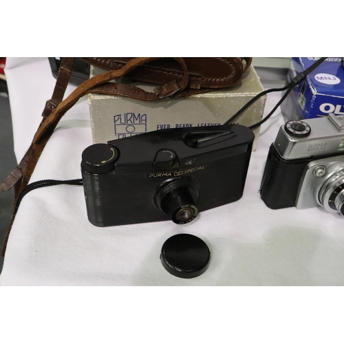 433 - Olympus Purma and Halina film cameras with accessories. P&P Group 2 (£18+VAT for the first lot and £... 