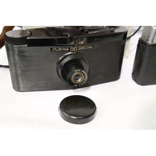 433 - Olympus Purma and Halina film cameras with accessories. P&P Group 2 (£18+VAT for the first lot and £... 