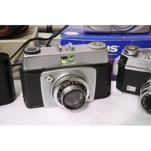 433 - Olympus Purma and Halina film cameras with accessories. P&P Group 2 (£18+VAT for the first lot and £... 