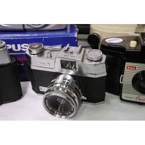 433 - Olympus Purma and Halina film cameras with accessories. P&P Group 2 (£18+VAT for the first lot and £... 