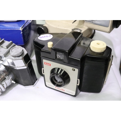 433 - Olympus Purma and Halina film cameras with accessories. P&P Group 2 (£18+VAT for the first lot and £... 