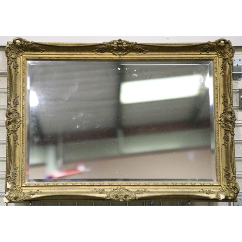 3042 - A 19th century gilt framed bevelled edge mirror, some losses to lower corners, 100 x 71 cm. Not avai... 