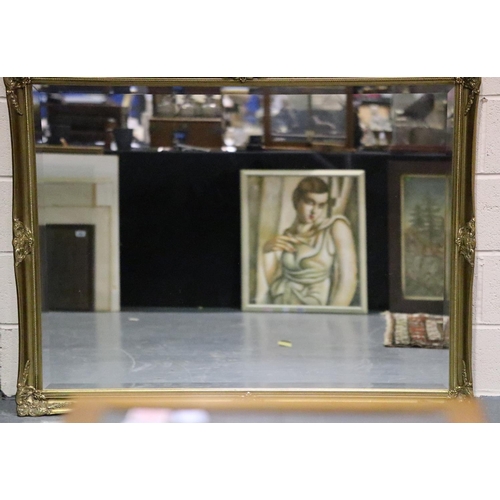 3044 - Large 20th century gilt framed bevelled edge mirror in good condition, 133 x 104 cm. Not available f... 