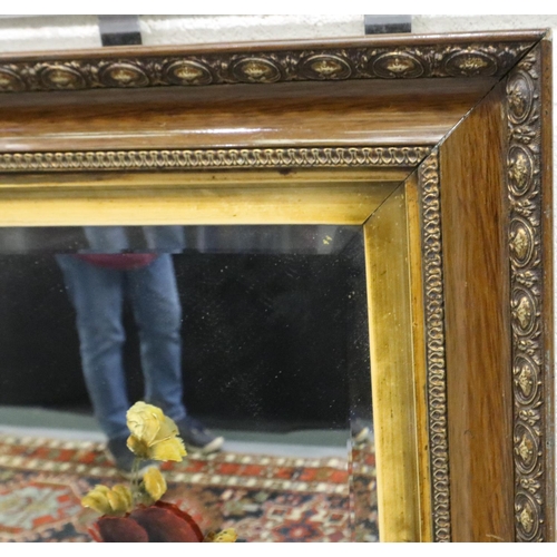 3047 - Victorian floral painting on a gilt framed mirror, 80 x 49 cm. Not available for in-house P&P