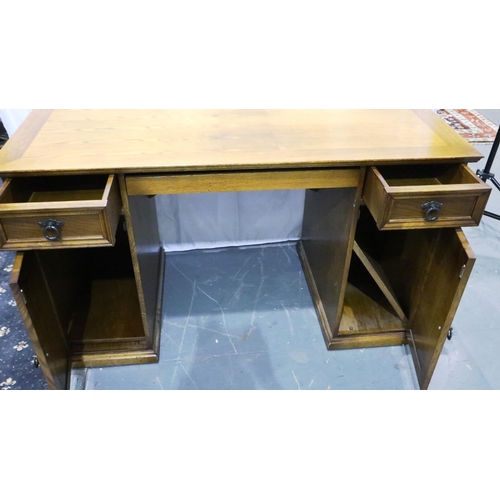 3075 - Oak twin pedestal desk with linenfold decoration and three drawers, 131 x 66 x 77 cm. Not available ... 