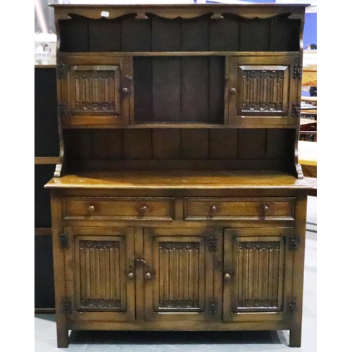 3089 - Oak linenfold sideboard with two drawers and five cupboards, 136 x 48 x 184 cm. Not available for in... 