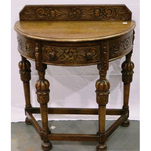 3097 - Heavily carved oak half moon table with single drawer, 40 x 72 x 78 cm H. Not available for in-house... 