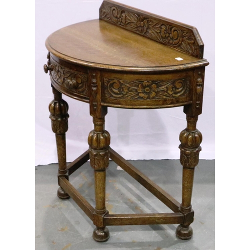 3097 - Heavily carved oak half moon table with single drawer, 40 x 72 x 78 cm H. Not available for in-house... 