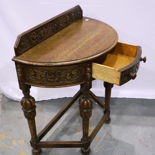 3097 - Heavily carved oak half moon table with single drawer, 40 x 72 x 78 cm H. Not available for in-house... 