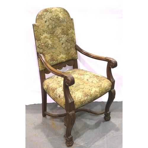 3100 - Oak framed tapestry upholstered arm chair with claw feet and cross stretcher. Not available for in-h... 