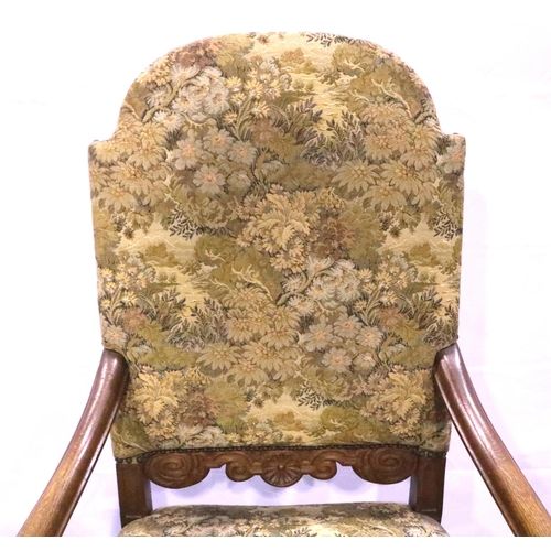 3100 - Oak framed tapestry upholstered arm chair with claw feet and cross stretcher. Not available for in-h... 