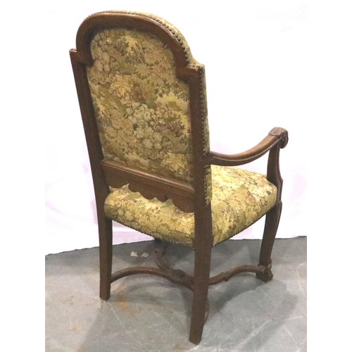 3100 - Oak framed tapestry upholstered arm chair with claw feet and cross stretcher. Not available for in-h... 