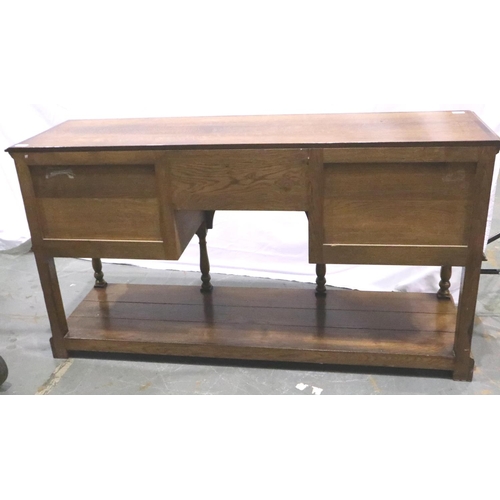 3102 - Cross banded oak sideboard with five drawers with turn supports rising from a solid base and swan ne... 