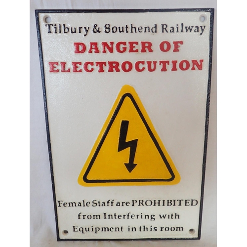 1005 - Cast iron danger of electrocution sign. P&P Group 1 (£14+VAT for the first lot and £1+VAT for subseq... 